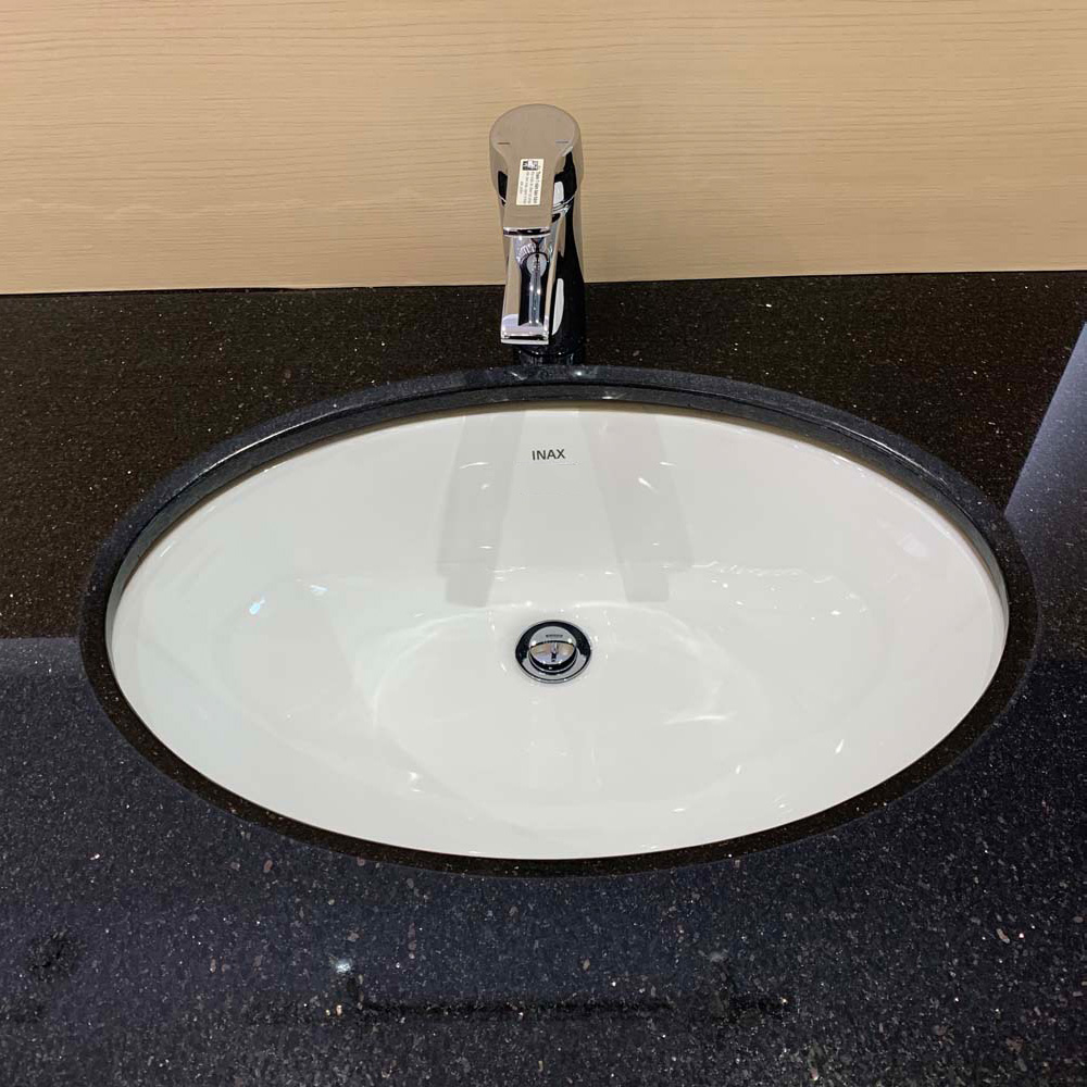 Chậu lavabo âm bàn INAX L-2216V dáng oval màu trắng